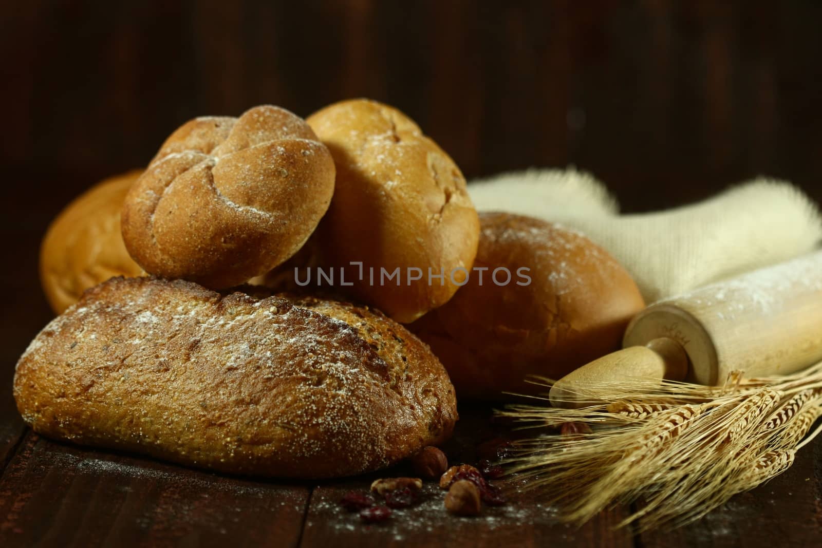 Fresh Baked Bread on Wooden Background