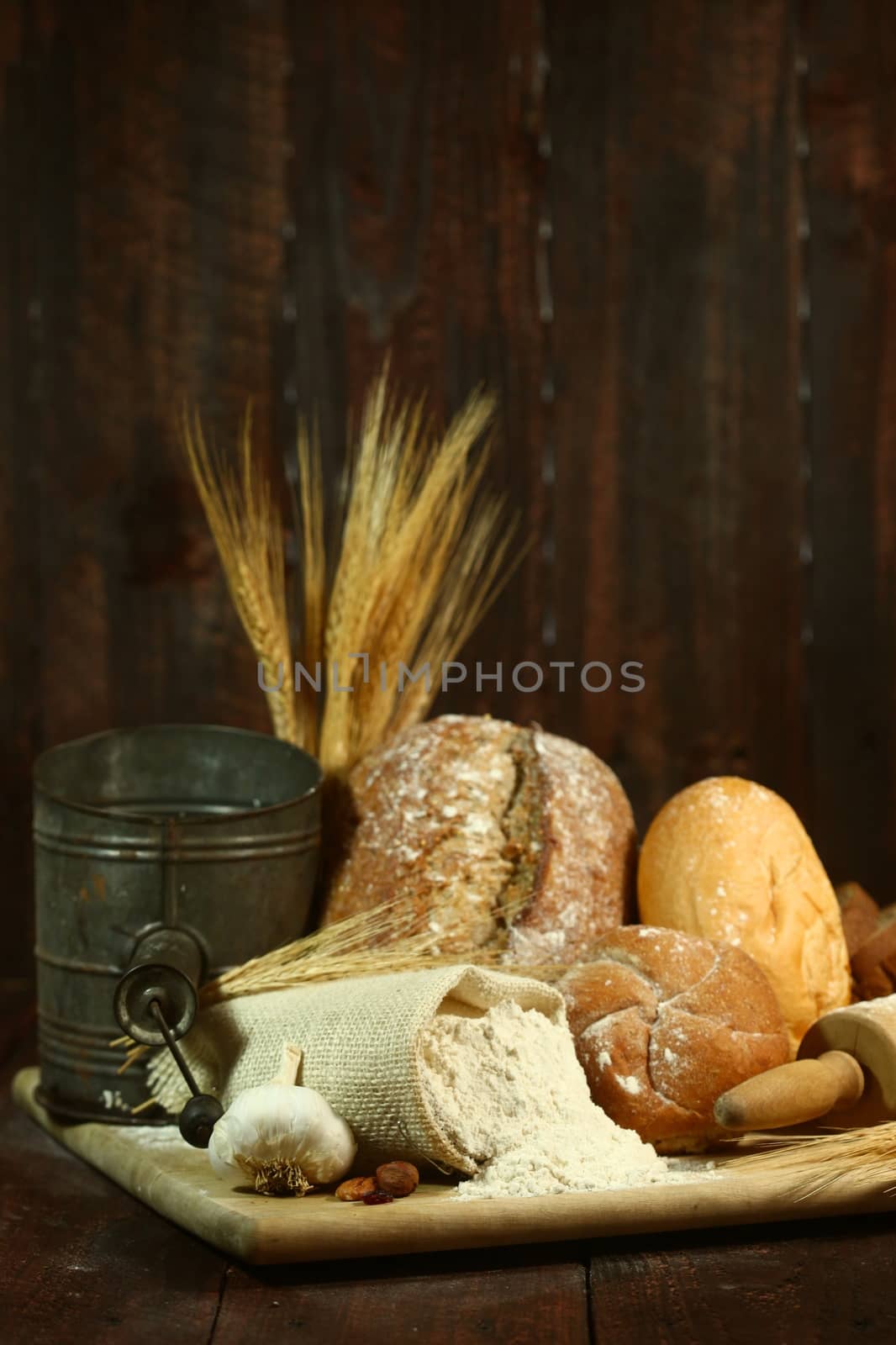 Fresh Baked Bread on Wooden Background