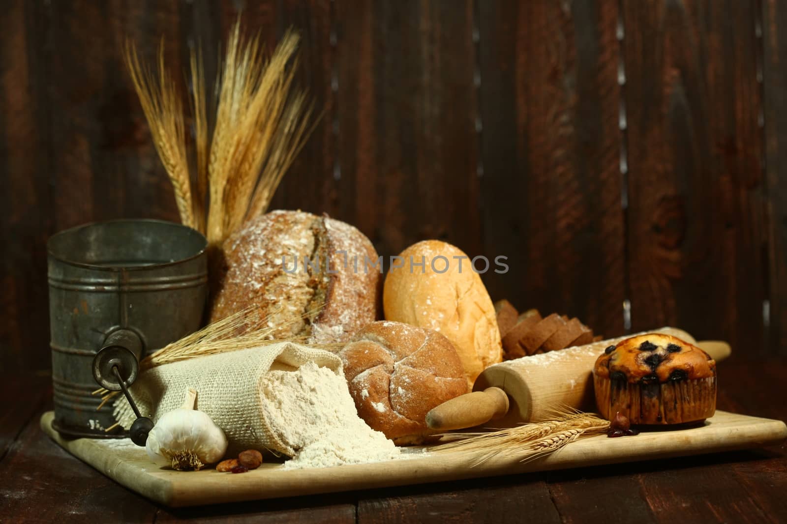 Fresh Baked Bread on Wooden Background