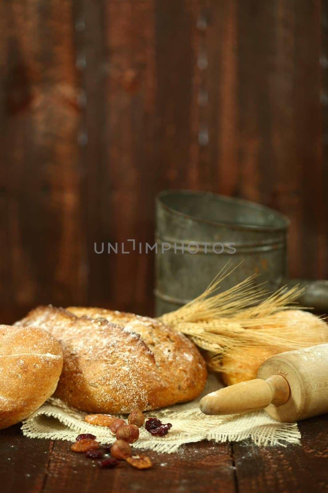 Fresh Baked Bread on Wooden Background