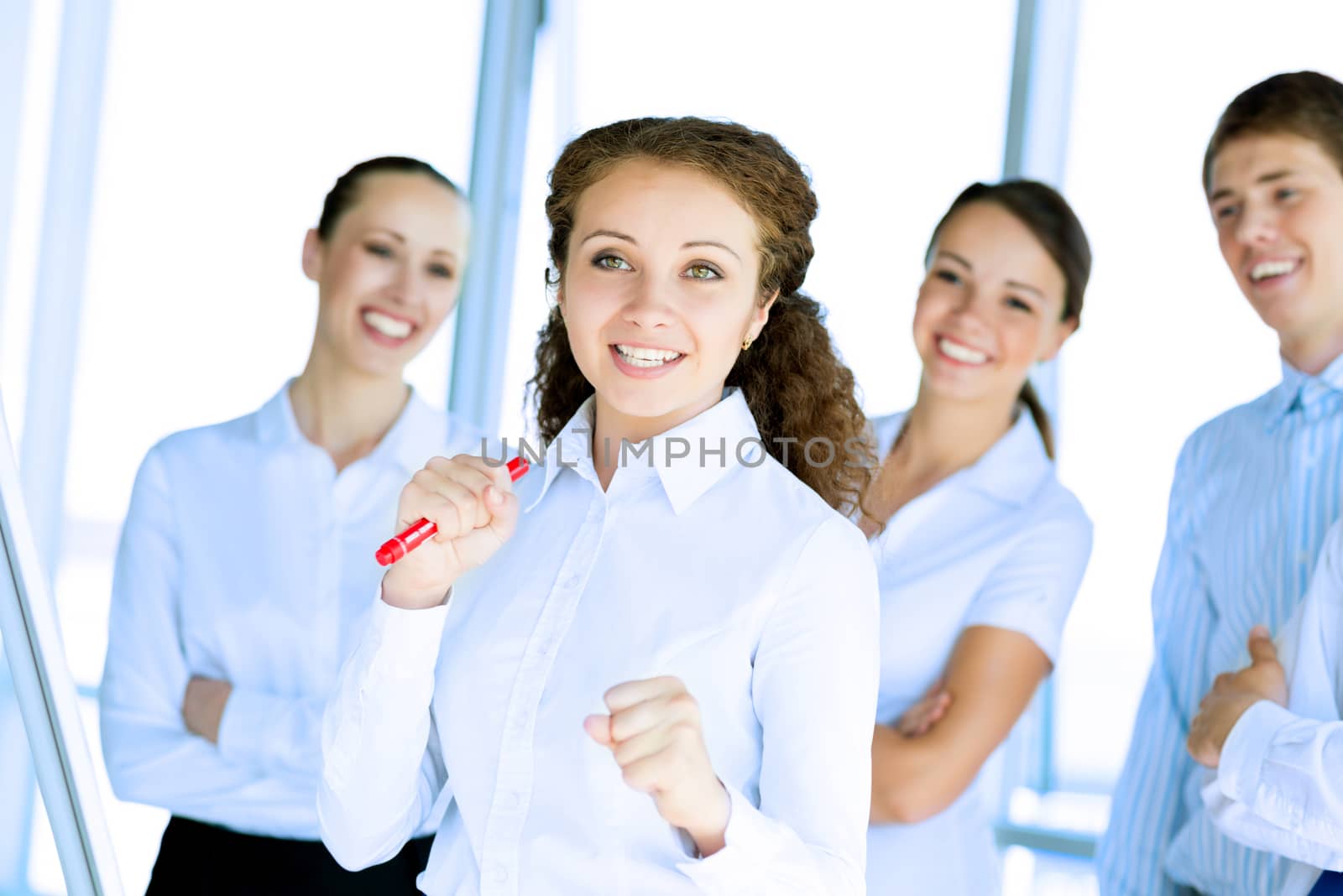 happy business woman standing next to their counterparts outside the flipchart achievements in business