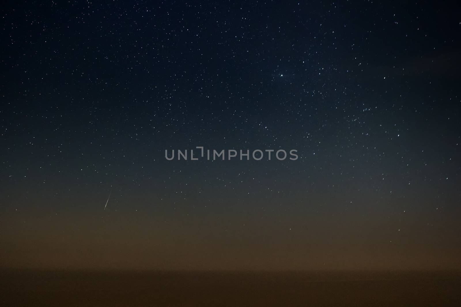 A meteor streaks the sky in Malta during the 2013 Perseid showers