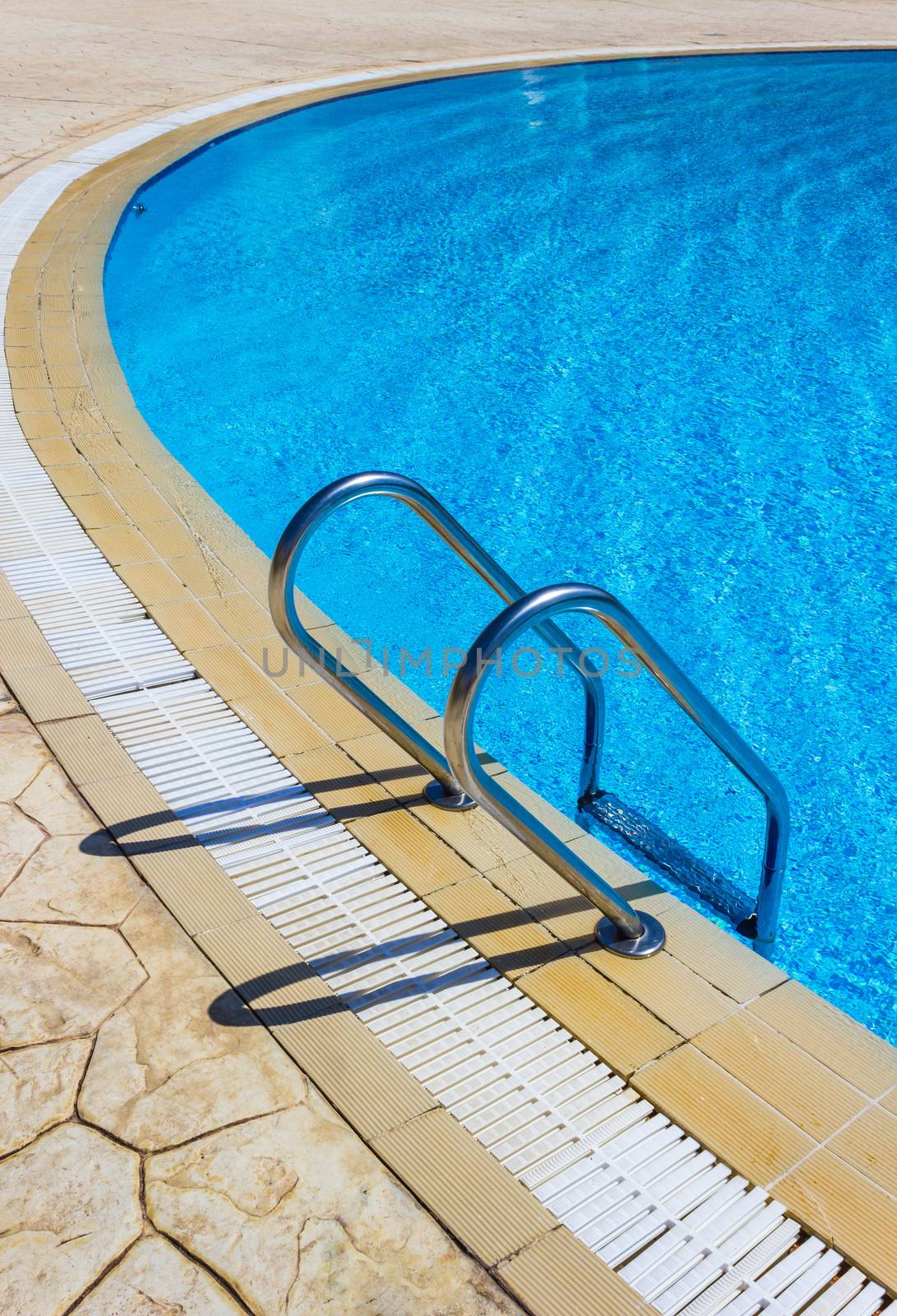 Grab bars ladder in the swimming pool by oleg_zhukov