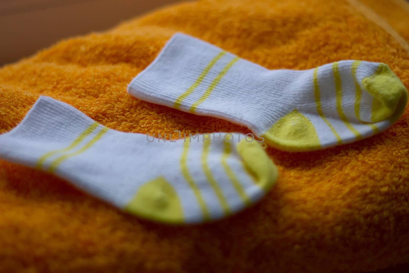 baby booties on towel