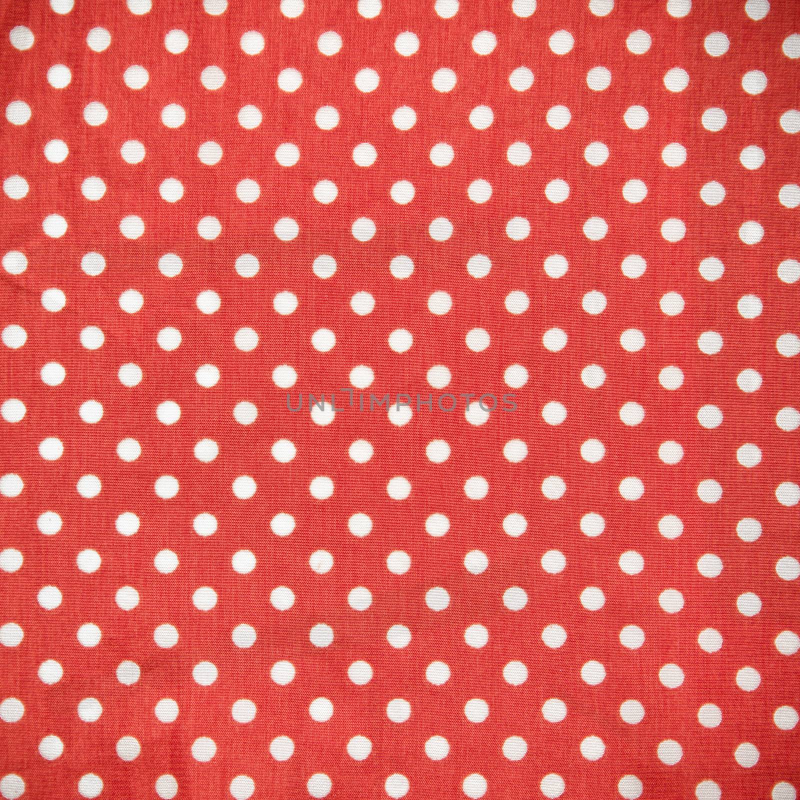 White Spot on Red Fabric Texture Background