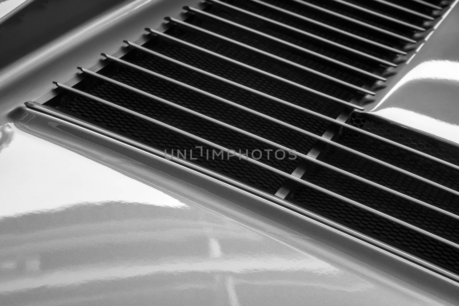 Abstract image showing detail fshot from a sportscar bodywork