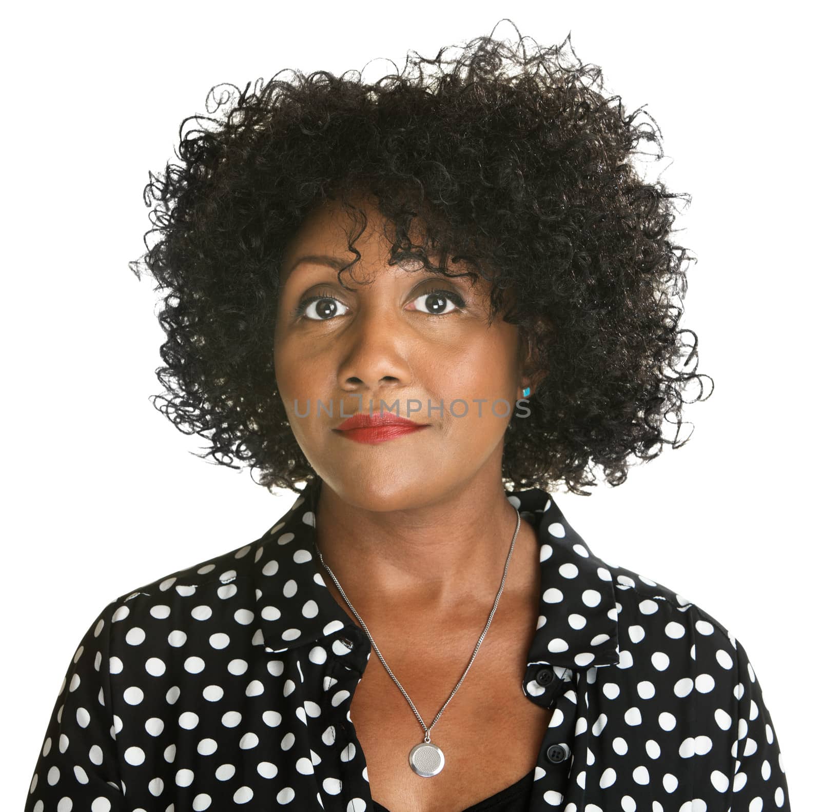 Serious middle aged African female on white background