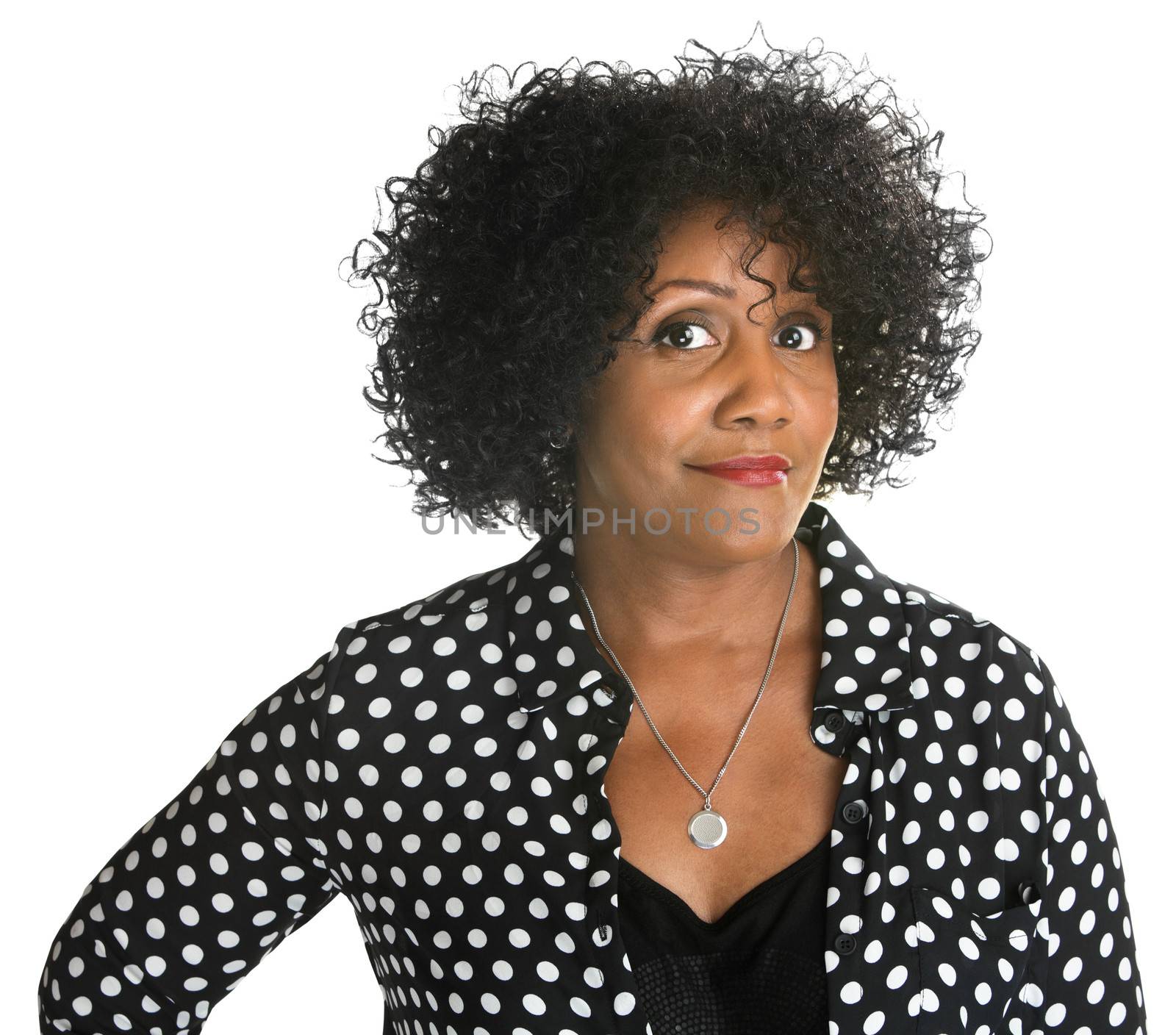 Determined pretty woman in polka dot on isolated  background