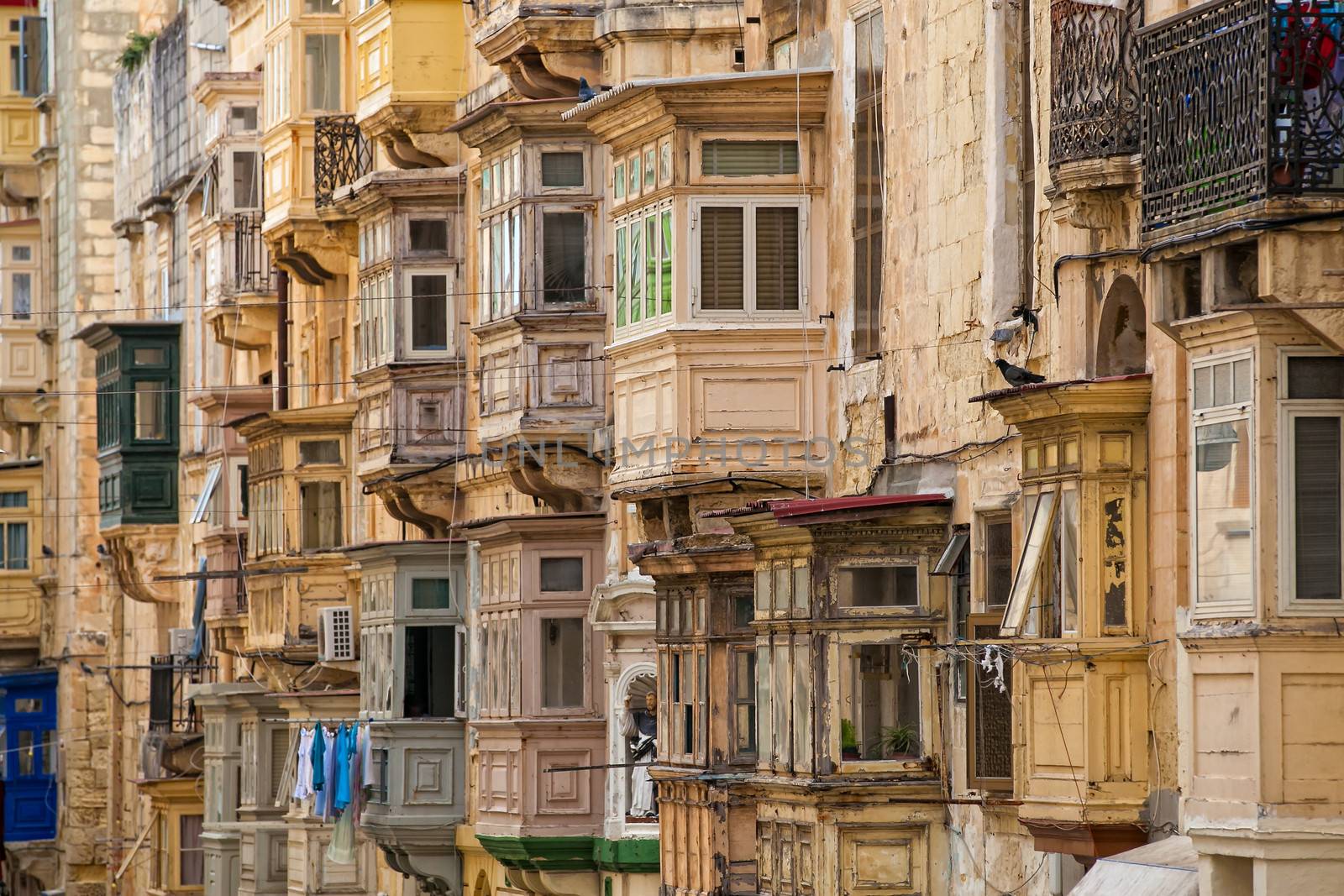 Detail shot of wooden balconies in obe of the streets of Valletta in Malta.