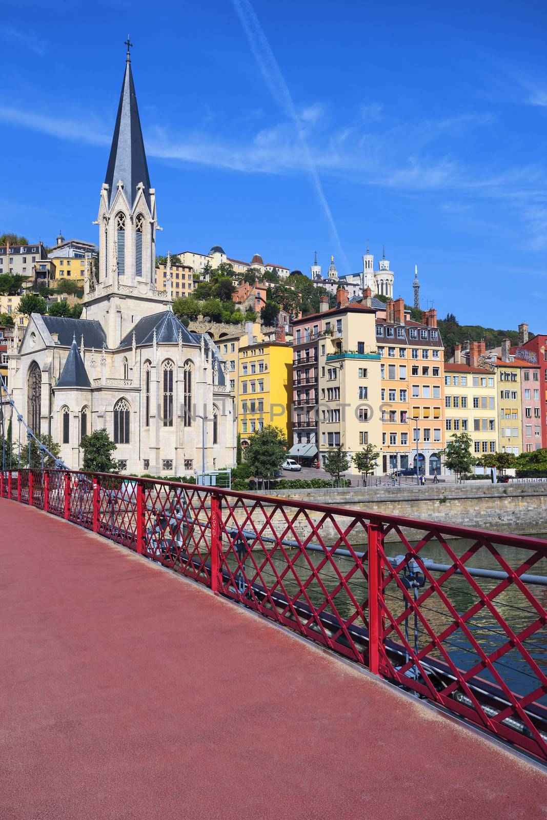 View of Lyon city and red footbridge on Saone river