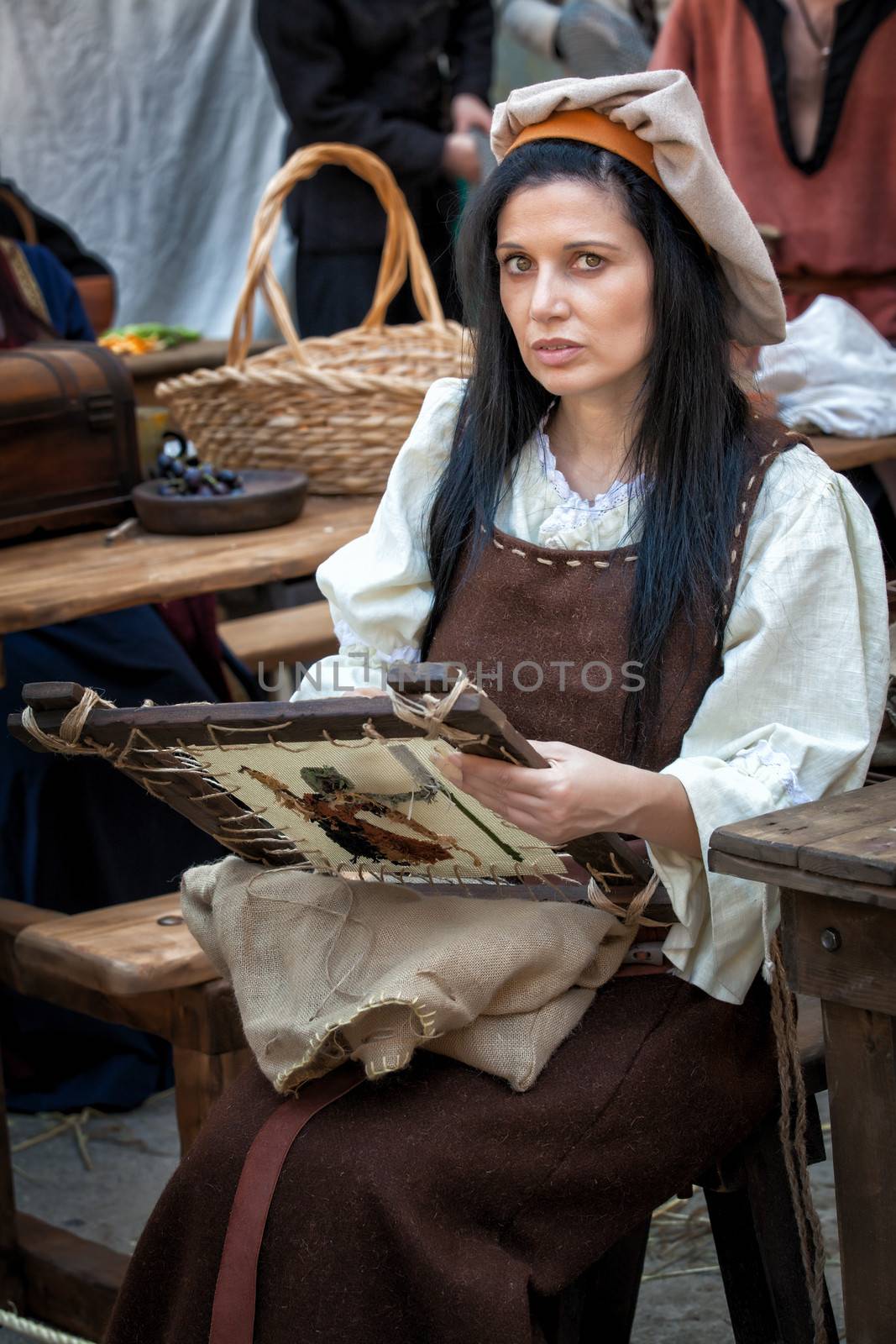 MDINA, MALTA - APR 13 - People in medieval costume taking part in the Medieval Mdina festival in Mdina on 13 April 2013