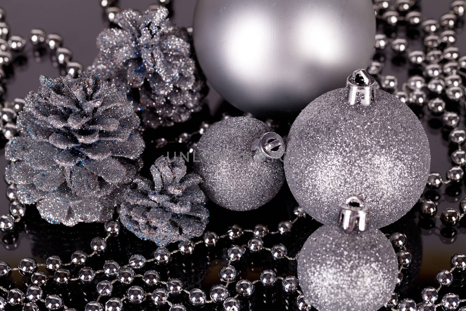 christmas decoration in grey silver glamour on black background