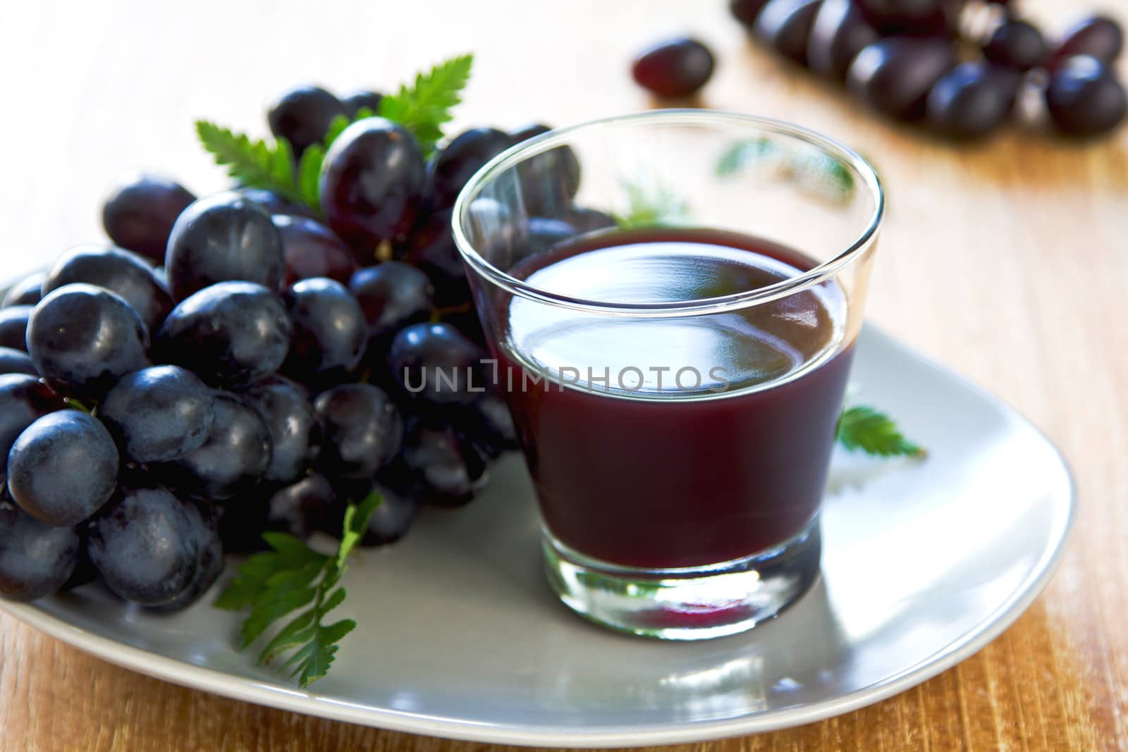 Fresh Grape juice by some Grape vines