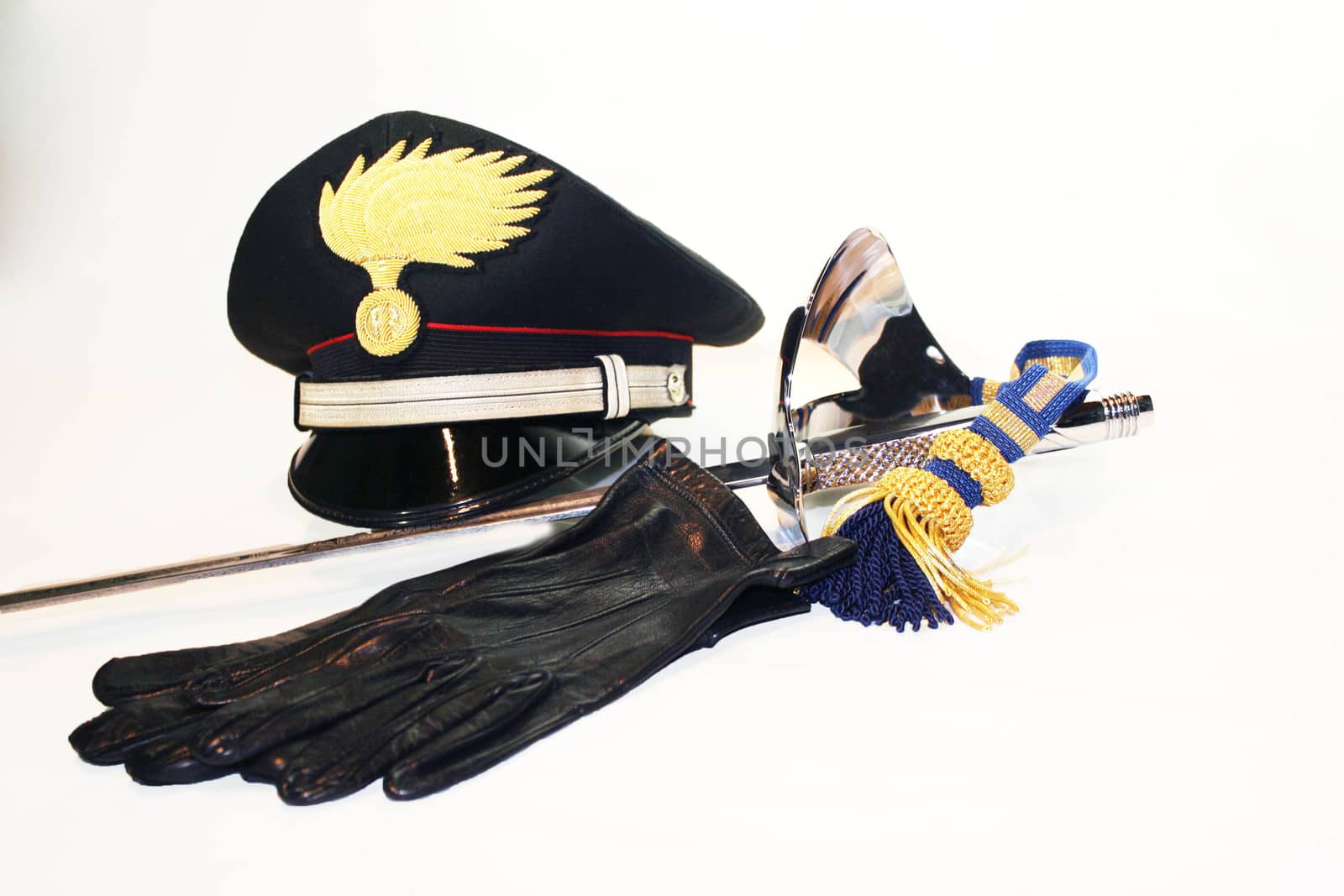 Close up of Carabinieri military and Police force  hat, gloves and saber by valentinacarpin