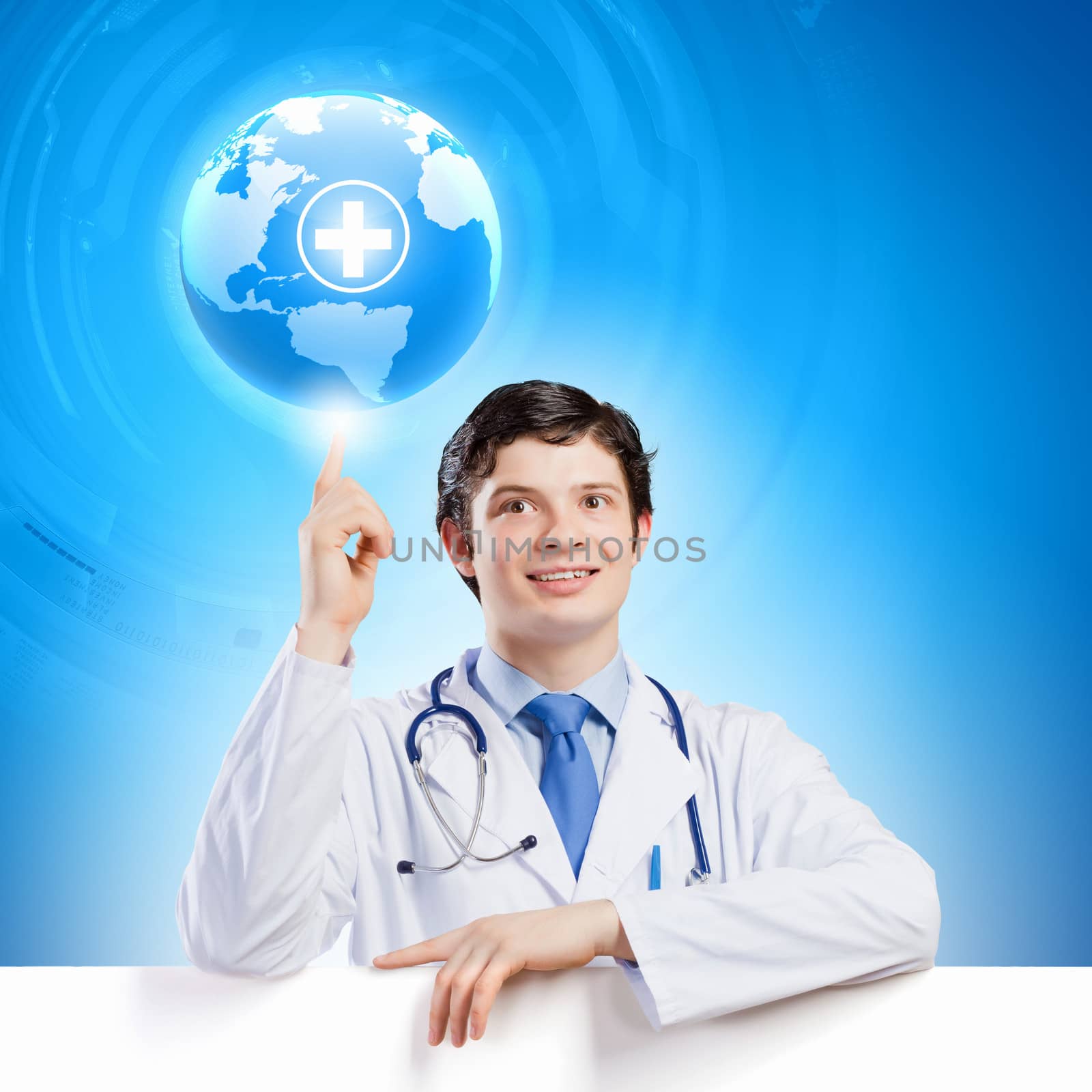 Young smiling doctor with blank banner. Place for text