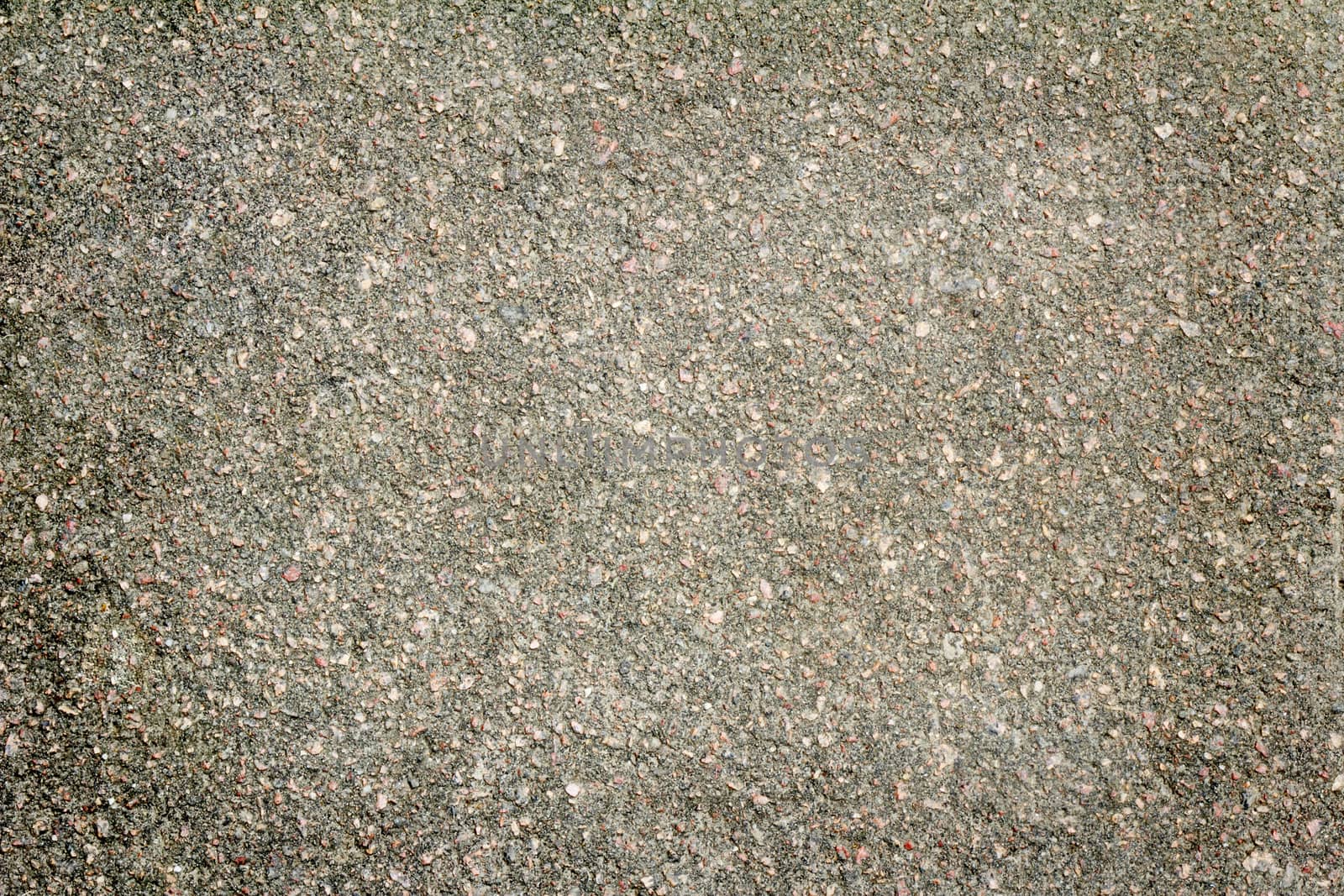 Photographed close-up section of the old asphalt road ( background ).
