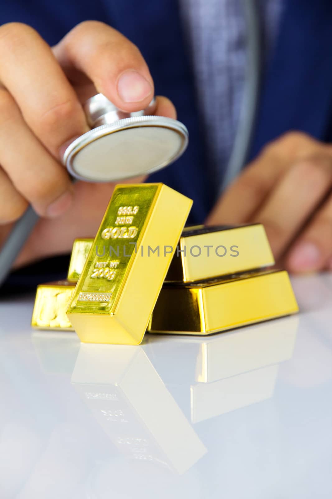 concept image of gold bars by ponsulak