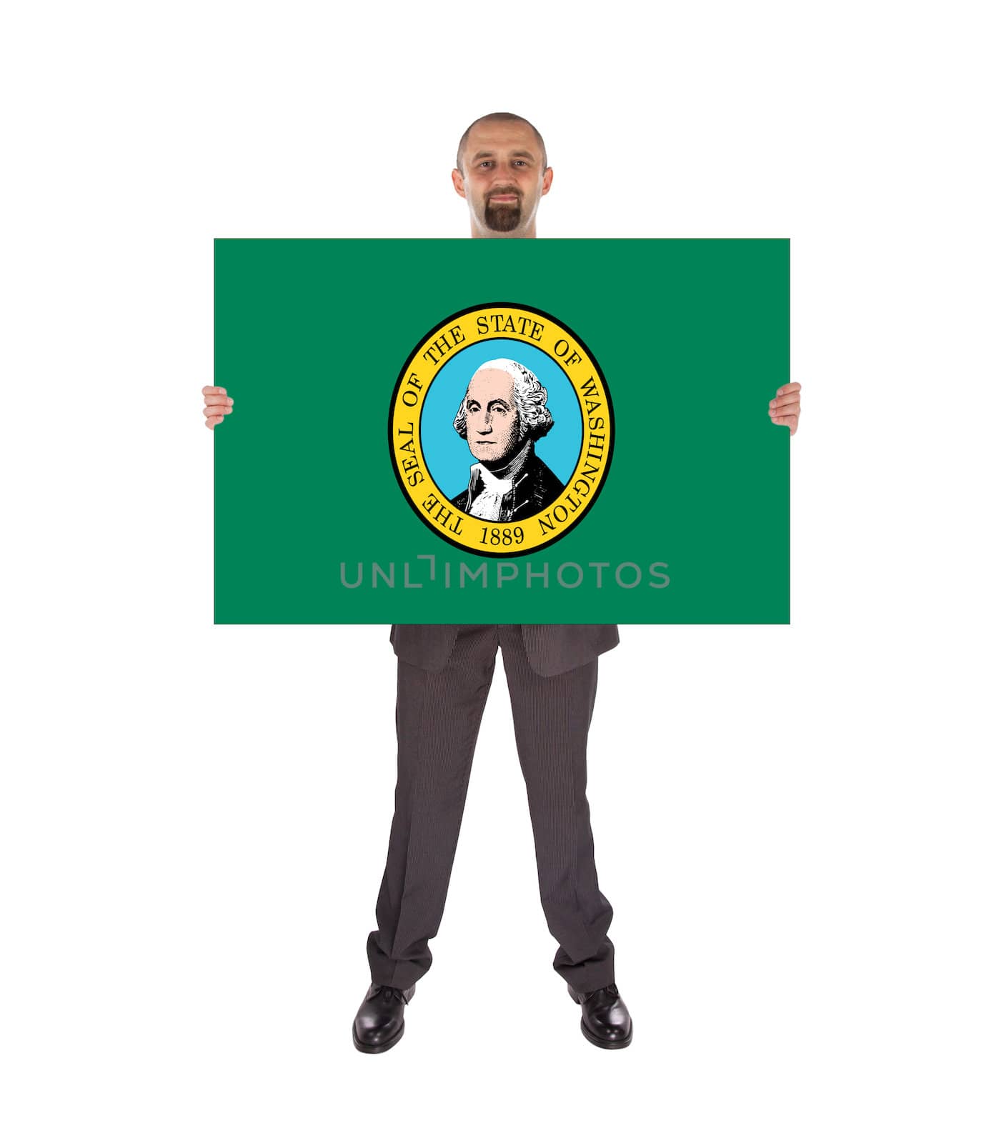 Smiling businessman holding a big card, flag of Washington, isolated on white