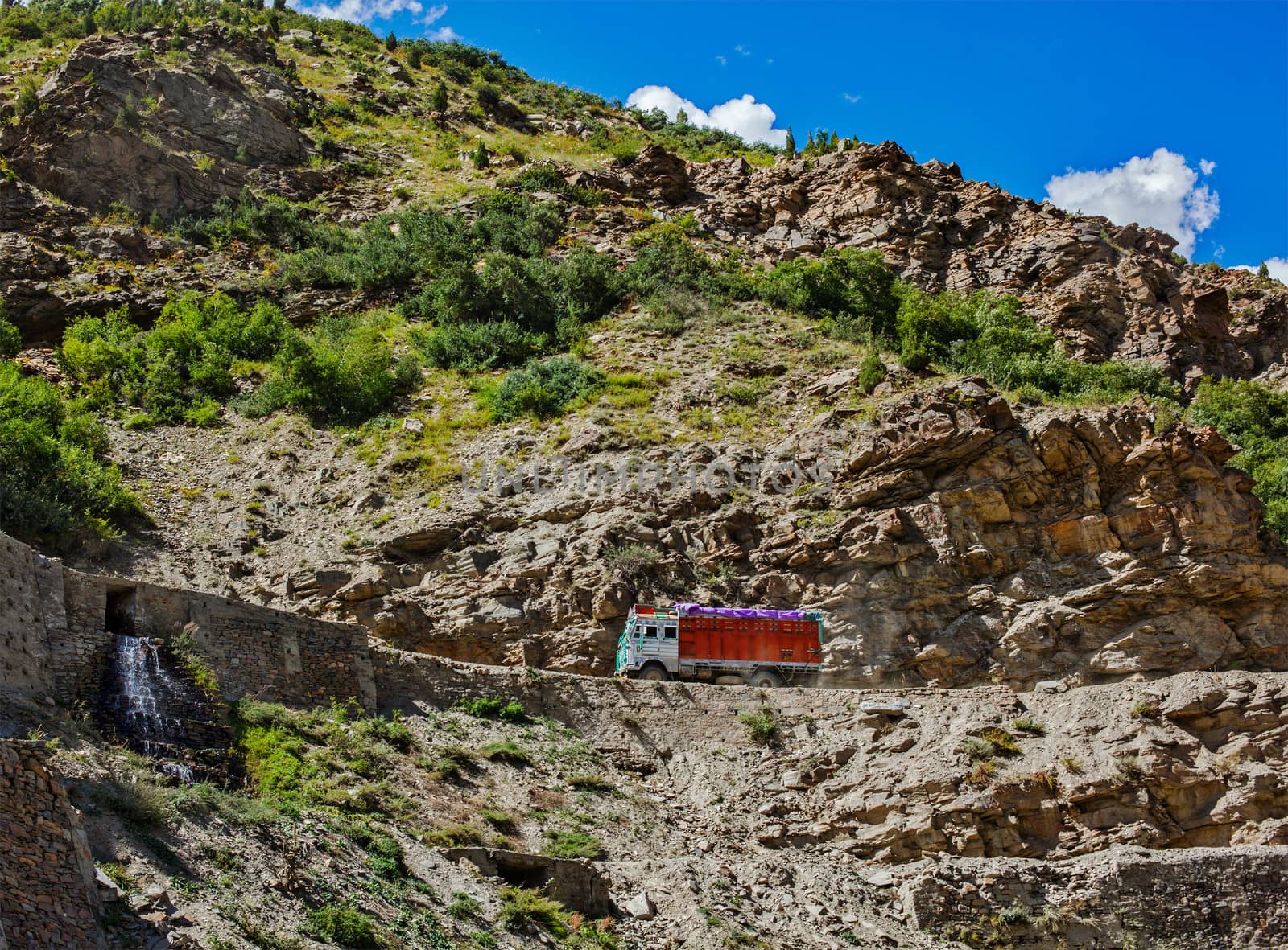 Manali-Leh road in Indian Himalayas with lorry. Himachal Pradesh, India