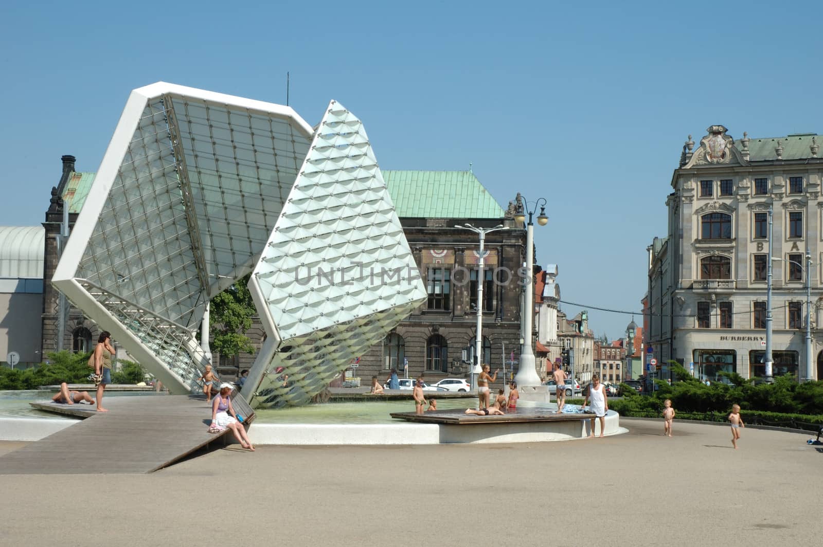 Freedom Fountain on Freedom Square in Poznan. Poland. Summer heat.