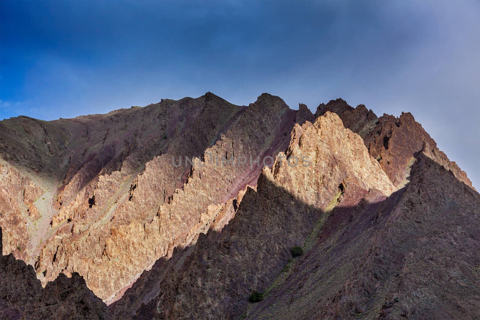 Himalayan mountain ragne top on sunset in Himalayas. Ladakh, India