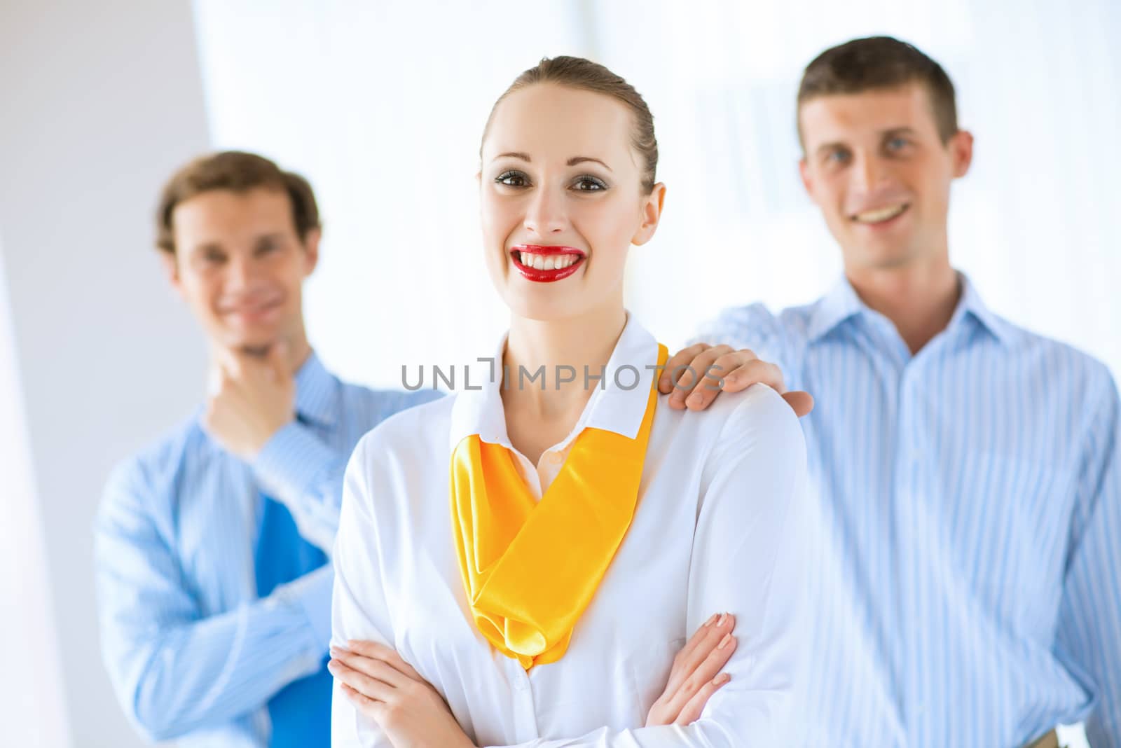 young successful business woman receiving congratulations from his colleagues