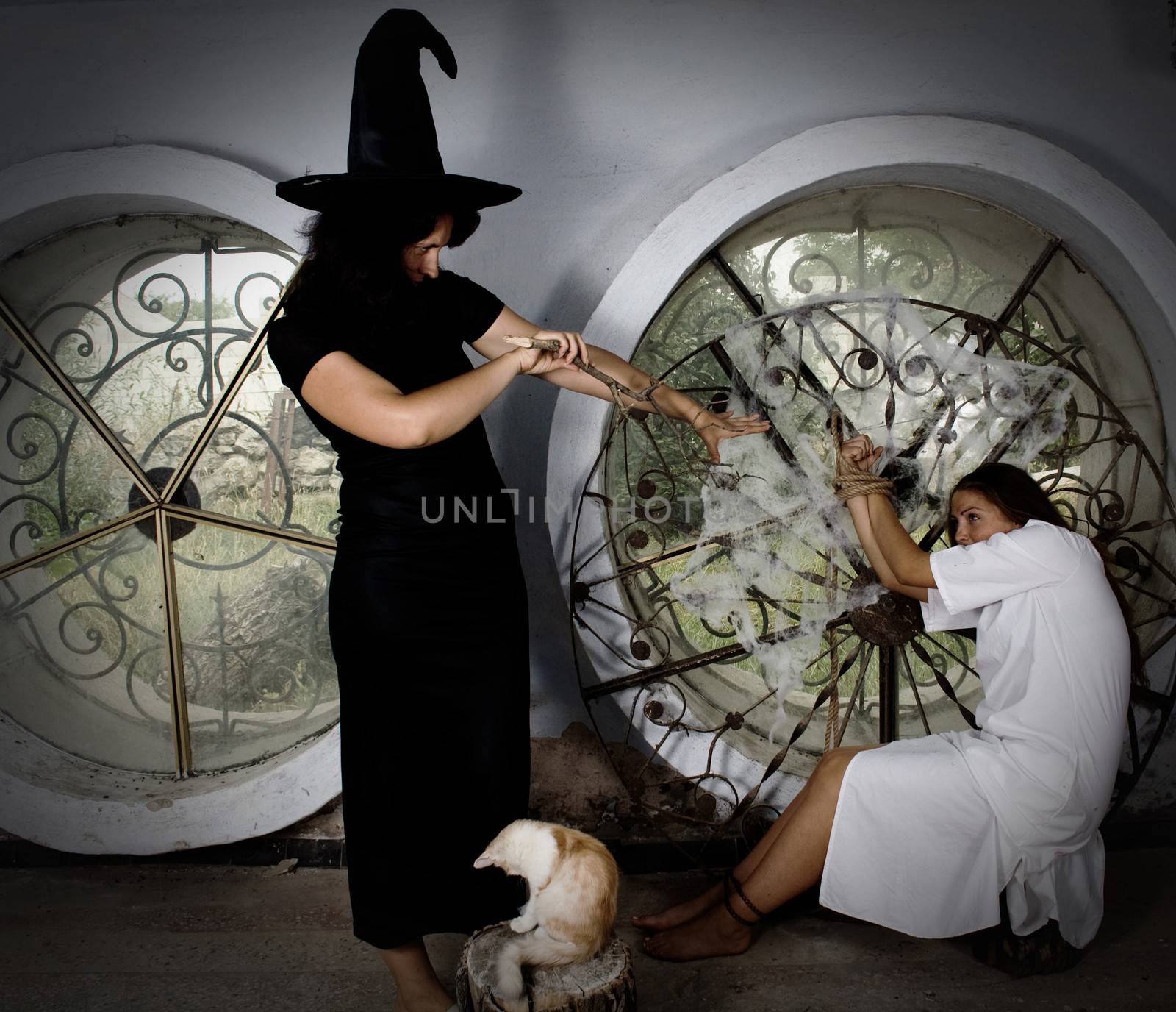 The evil witch tries to conjure fairy godmother