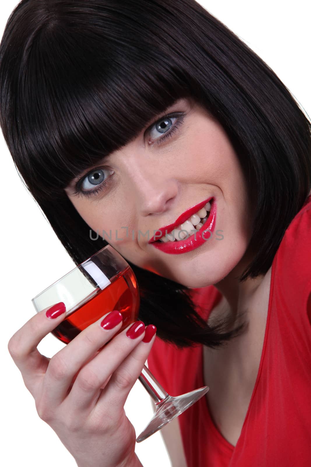 Woman in red with a glass of rose by phovoir