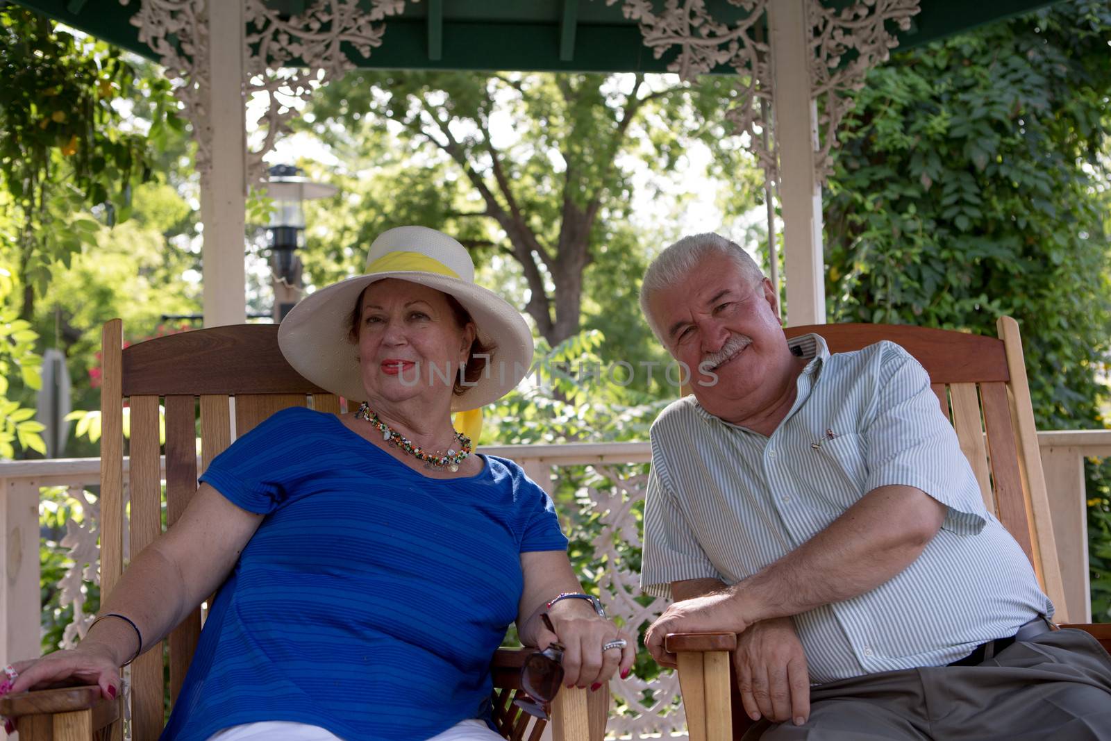 Senior couple looking at camera with trust