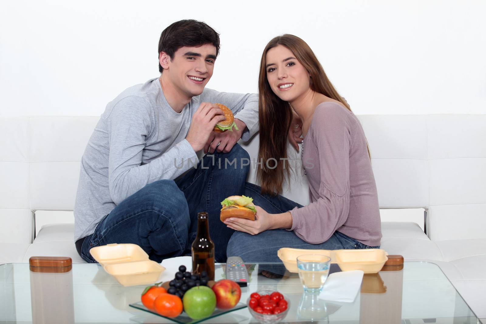 Couple eating fast food