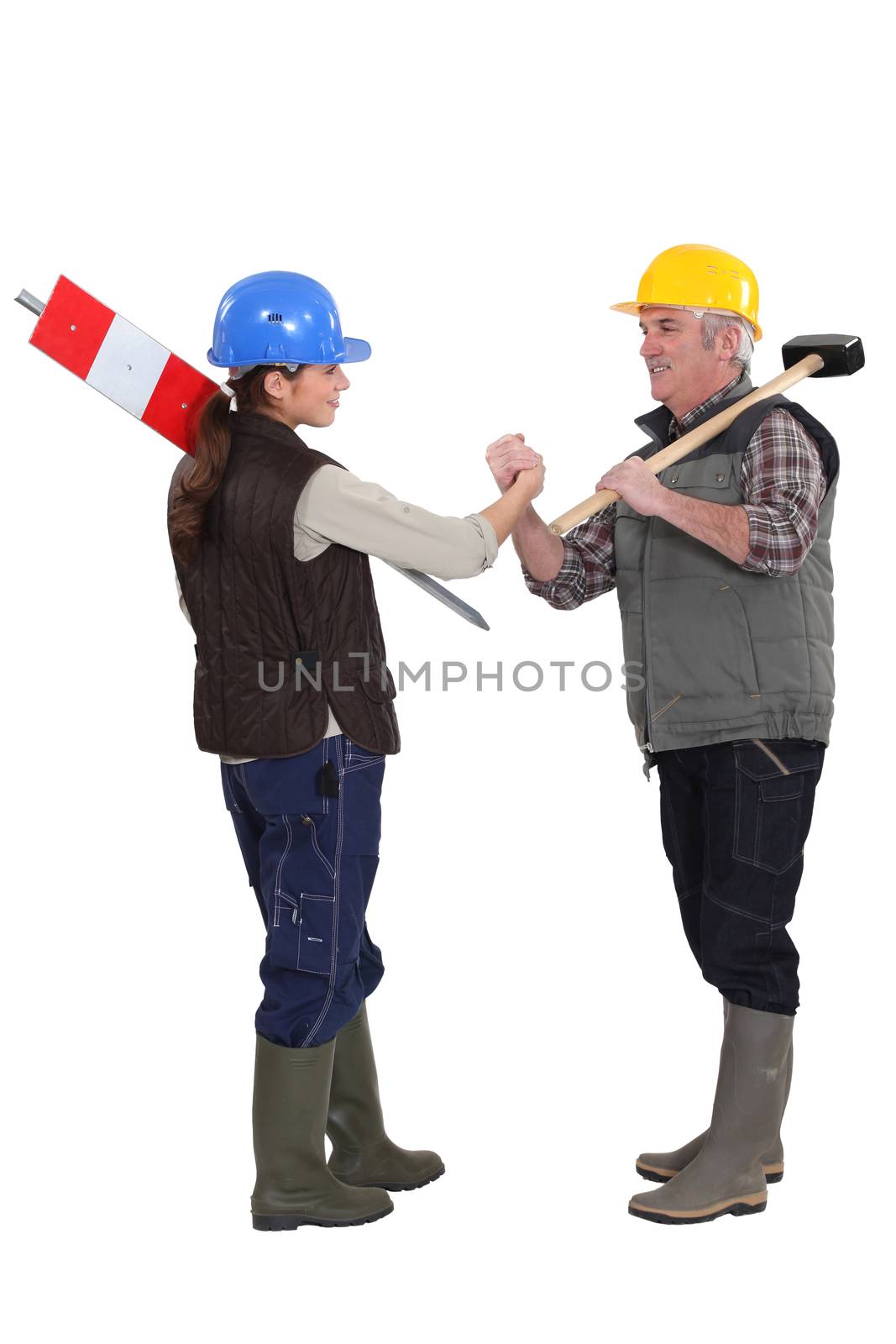 Apprentice and master shaking hands