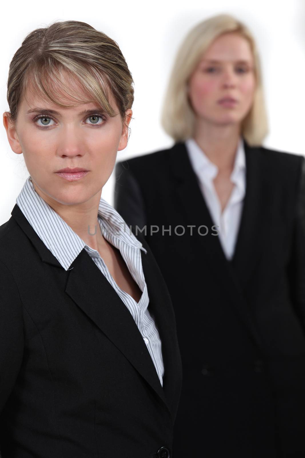 Serious businesswomen by phovoir