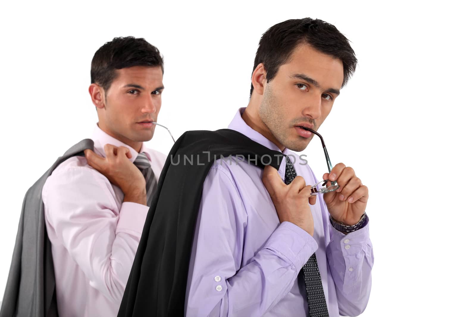 Businessmen holding their jackets