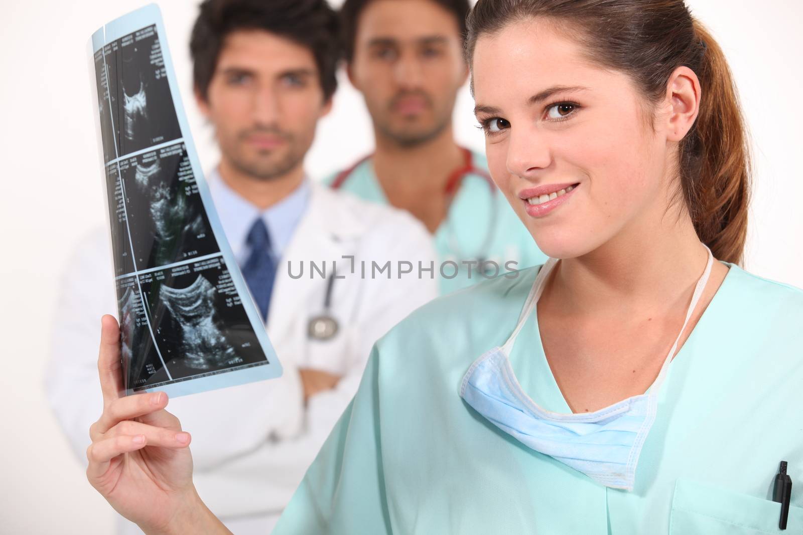 Nurse looking at ultrasound by phovoir