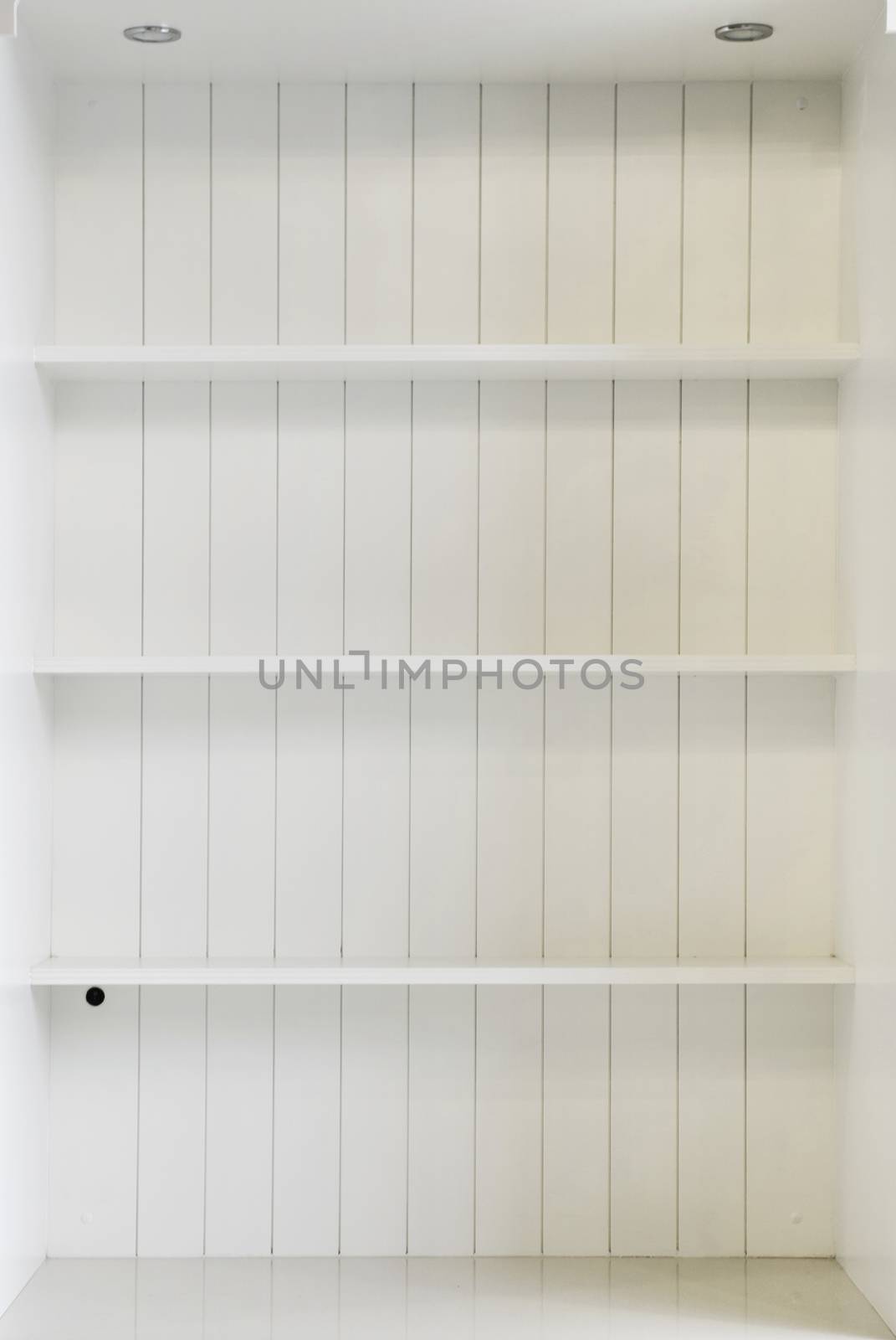 White wooden shelf  by siraanamwong