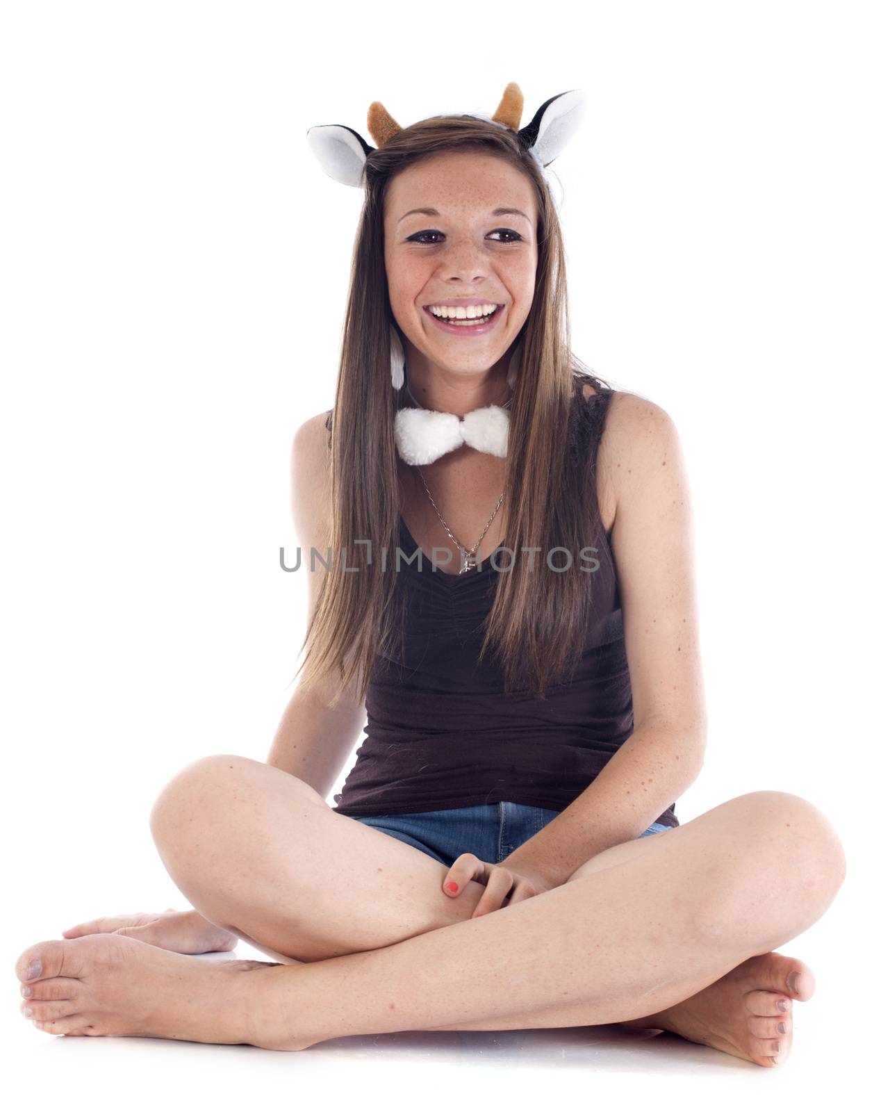 girl and fancy dress in front of white background
