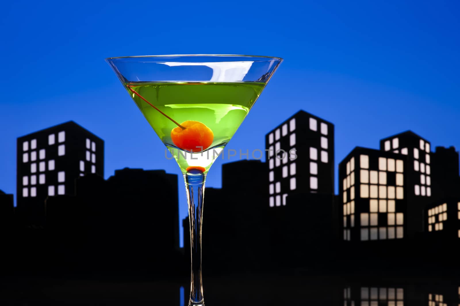 Metropolis Apple Martini cocktail in skyline setting
