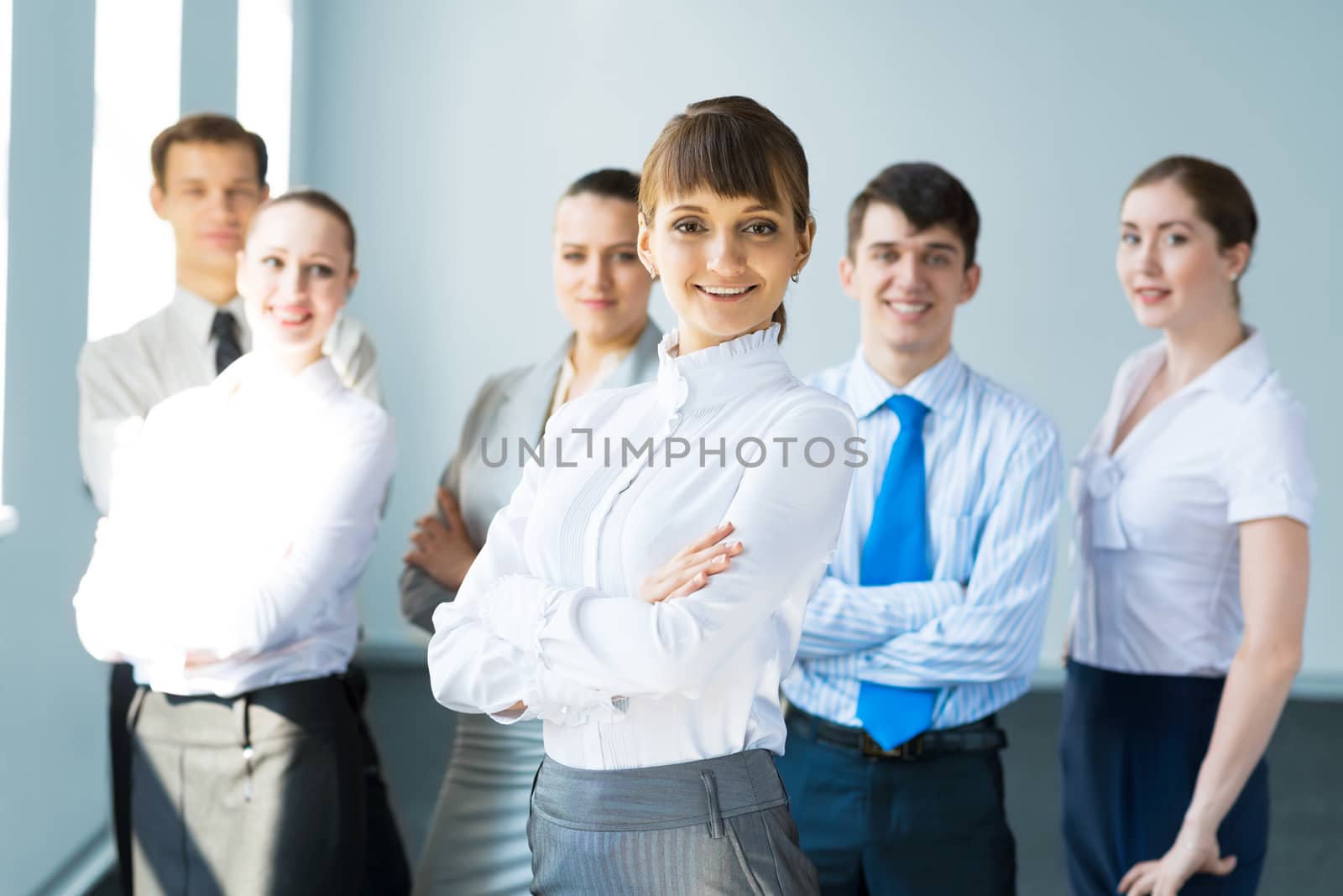 concept of teamwork, business woman crossed her arms over her team