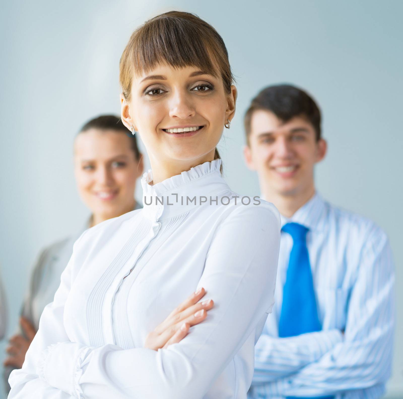 concept of teamwork, business woman crossed her arms over her team