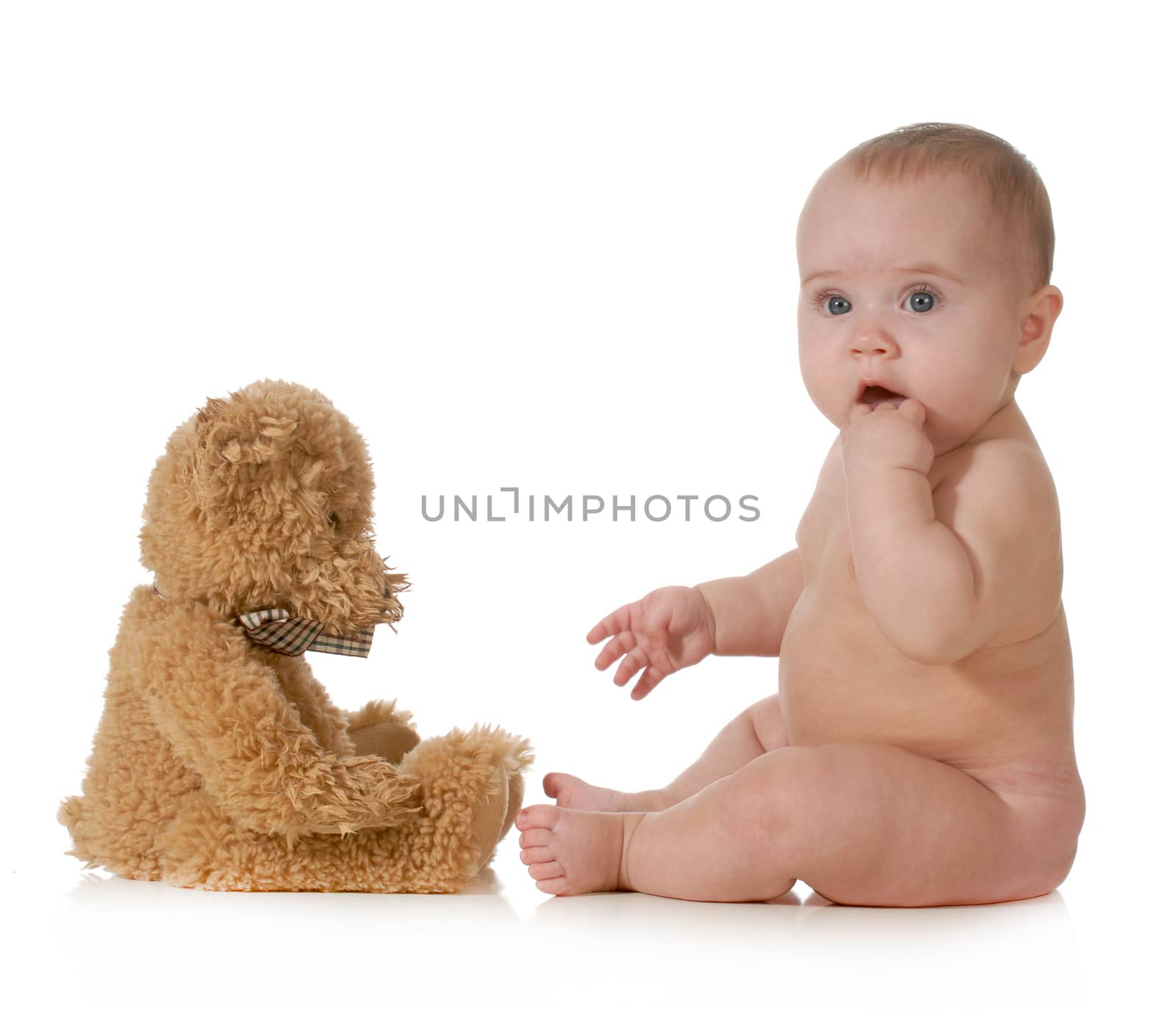 baby and teddy bear isolated on white background