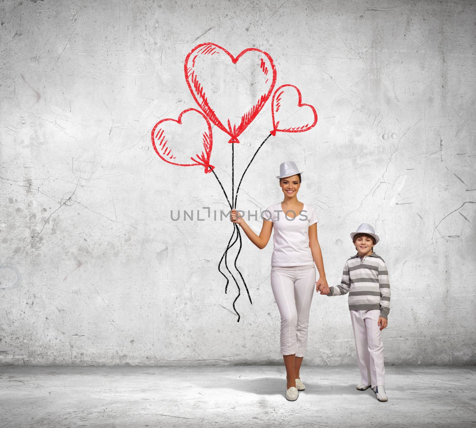 Image of mother and son holding bunch of colorful balloons