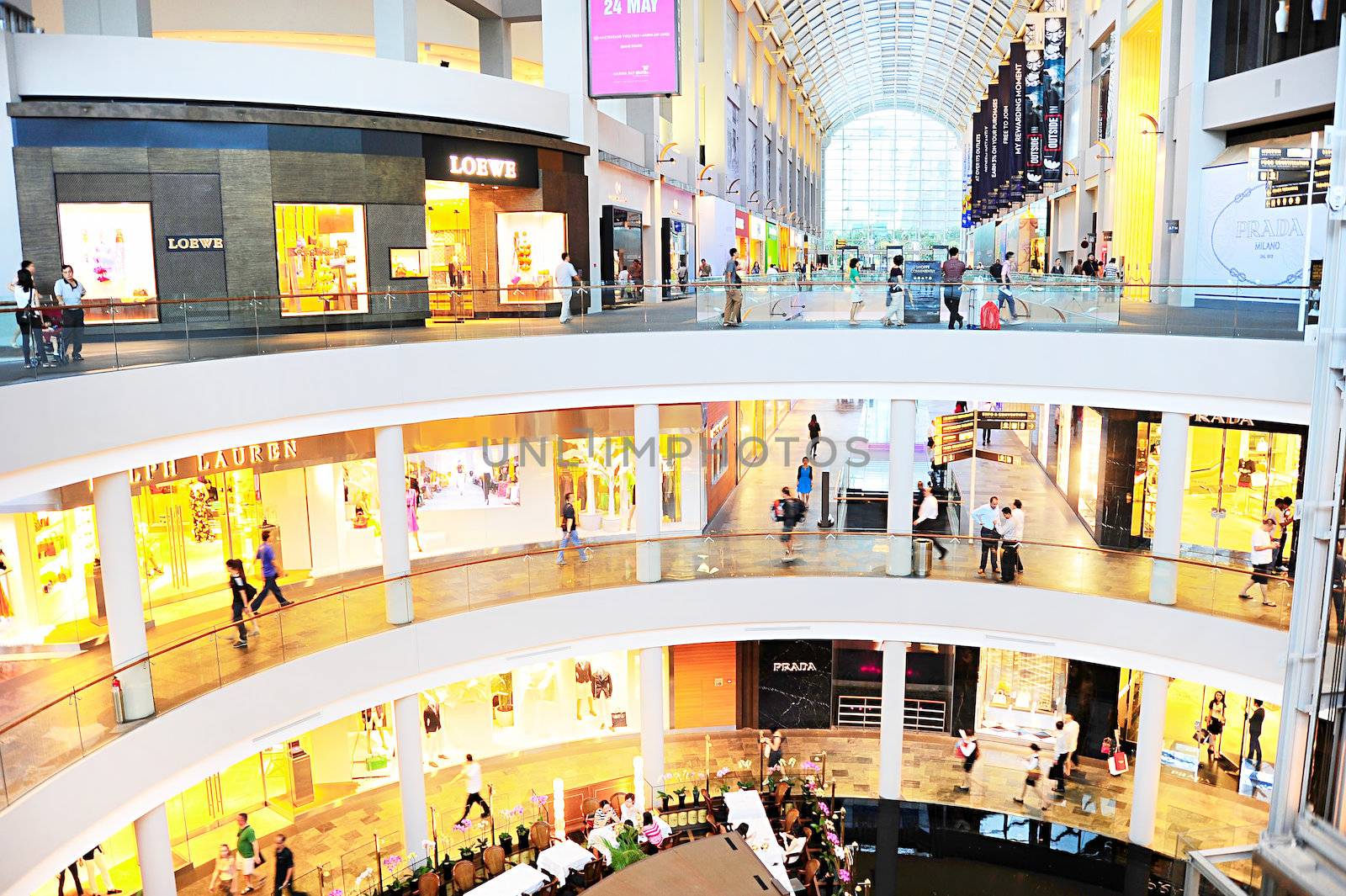 Singapore, Republic of Singapore - March 08, 2013: Shopping mall at Marina Bay Sands Resort in Singapore. It is billed as the world's most expensive standalone casino property at S$8 billion 