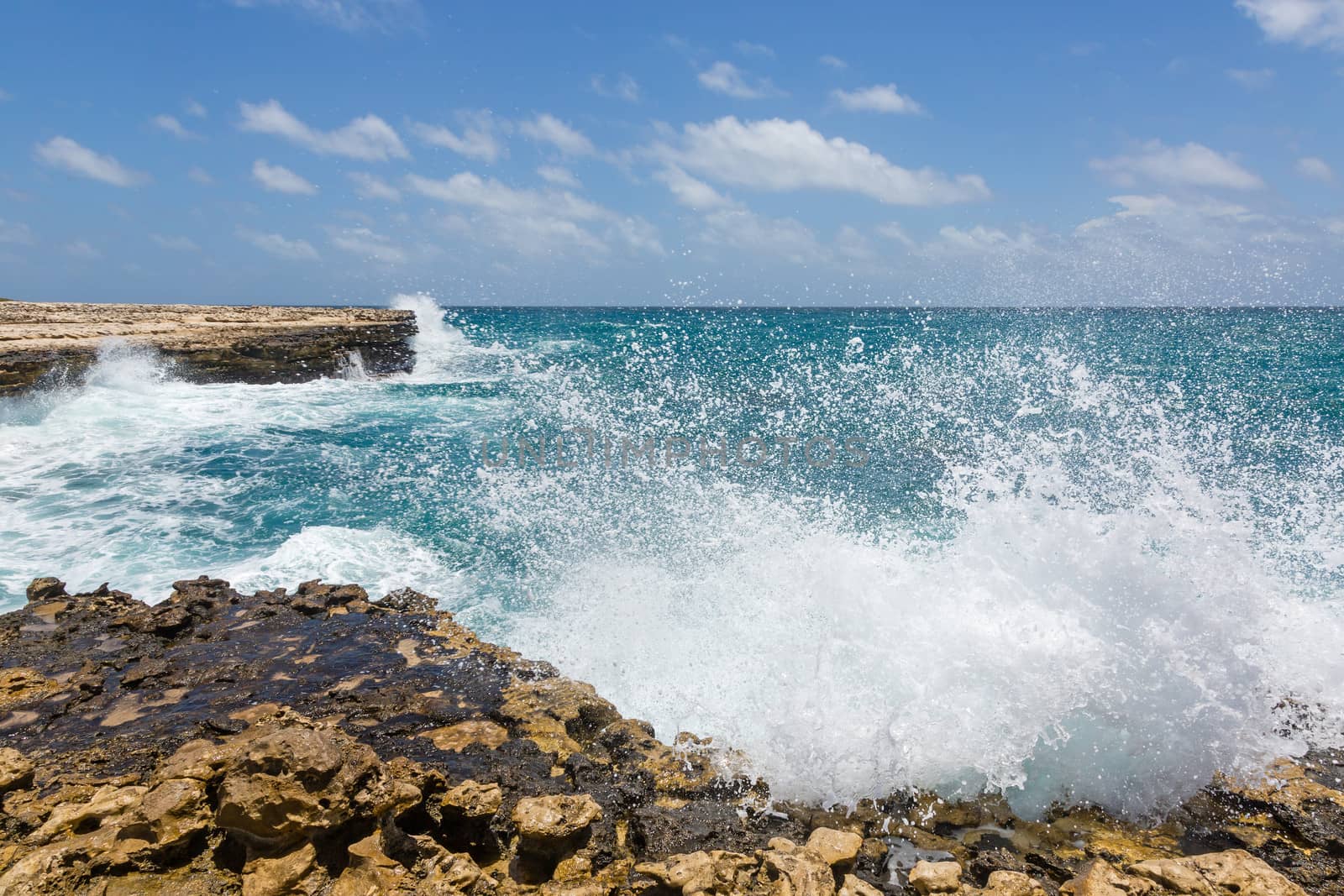 Waves Crashing on Rocks at Devil's Bridge Antigua by scheriton