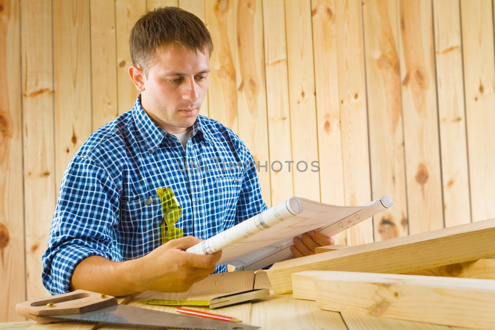 worker with blueprint