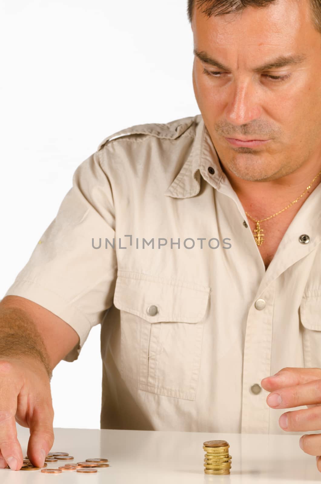 Guy counting some small change, a personal finance concept