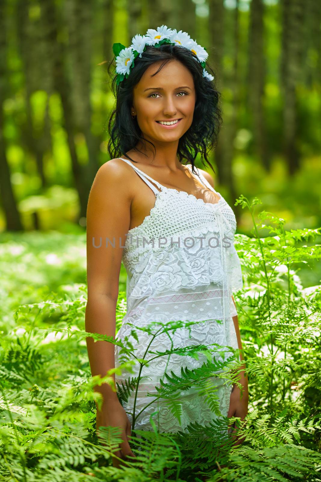 beautiful brunette in forest