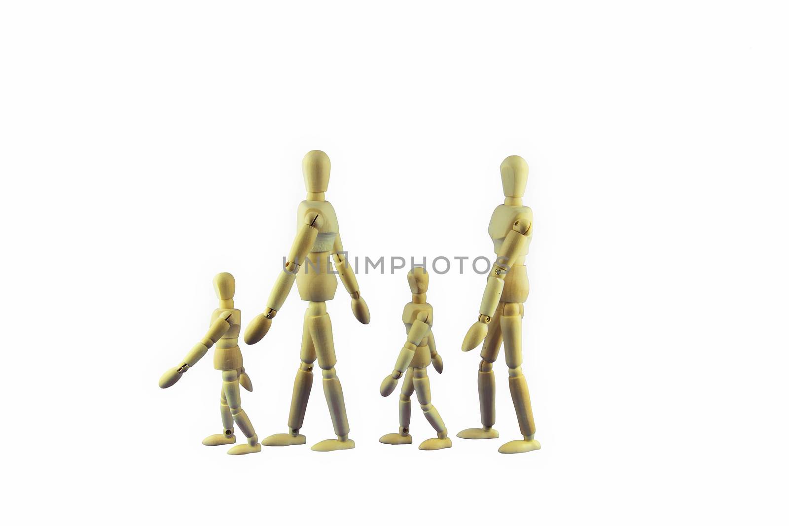 A wooden dummy family is walking in single file.