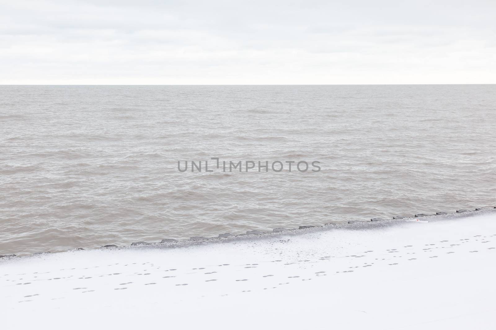 Snow on Christmas day in Chicago near Lake Michigan shore.