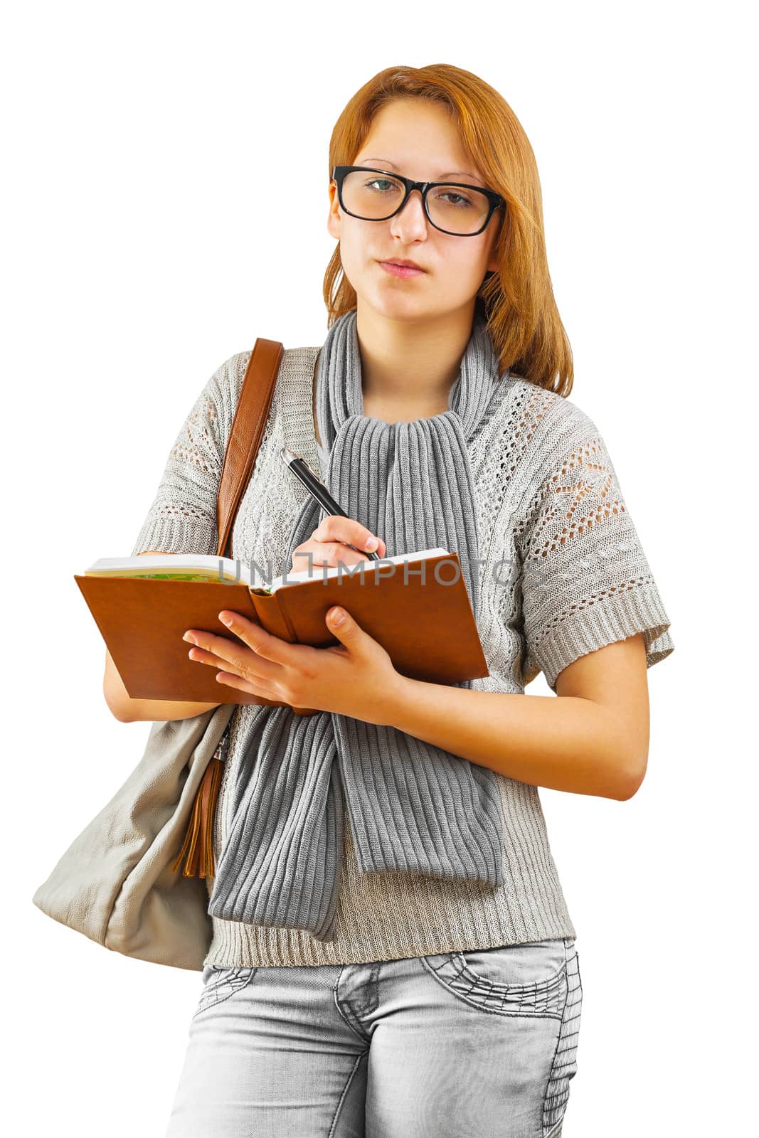 hipster girl writing with ballpoint pen by mihalec