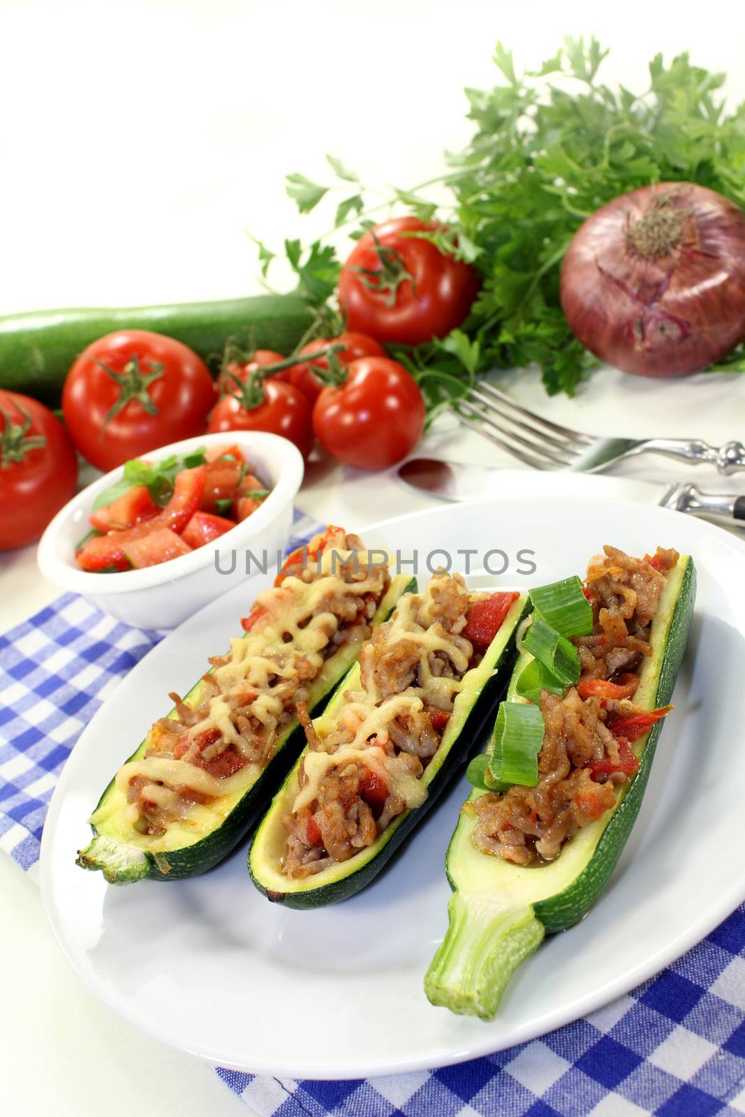 baked zucchini filled with mince meat and tomato